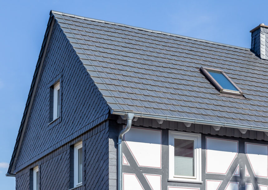 Half-timbered house with modern noble slate flat tile