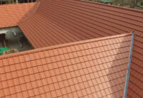 Refurbished deer park with WALTHER-tegula flat tiles in red-brown on the roof